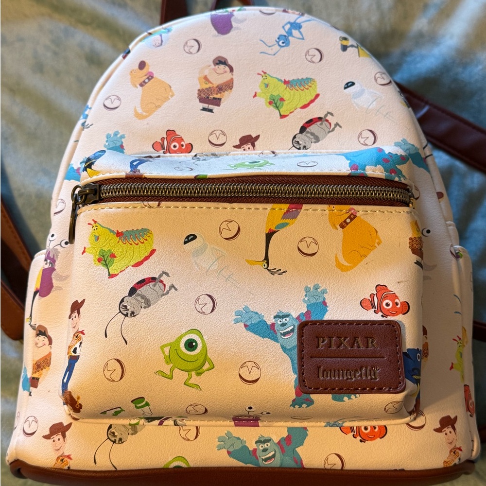 Loungefly Disney Pixar 25th Anniversary Icons Mini Backpack